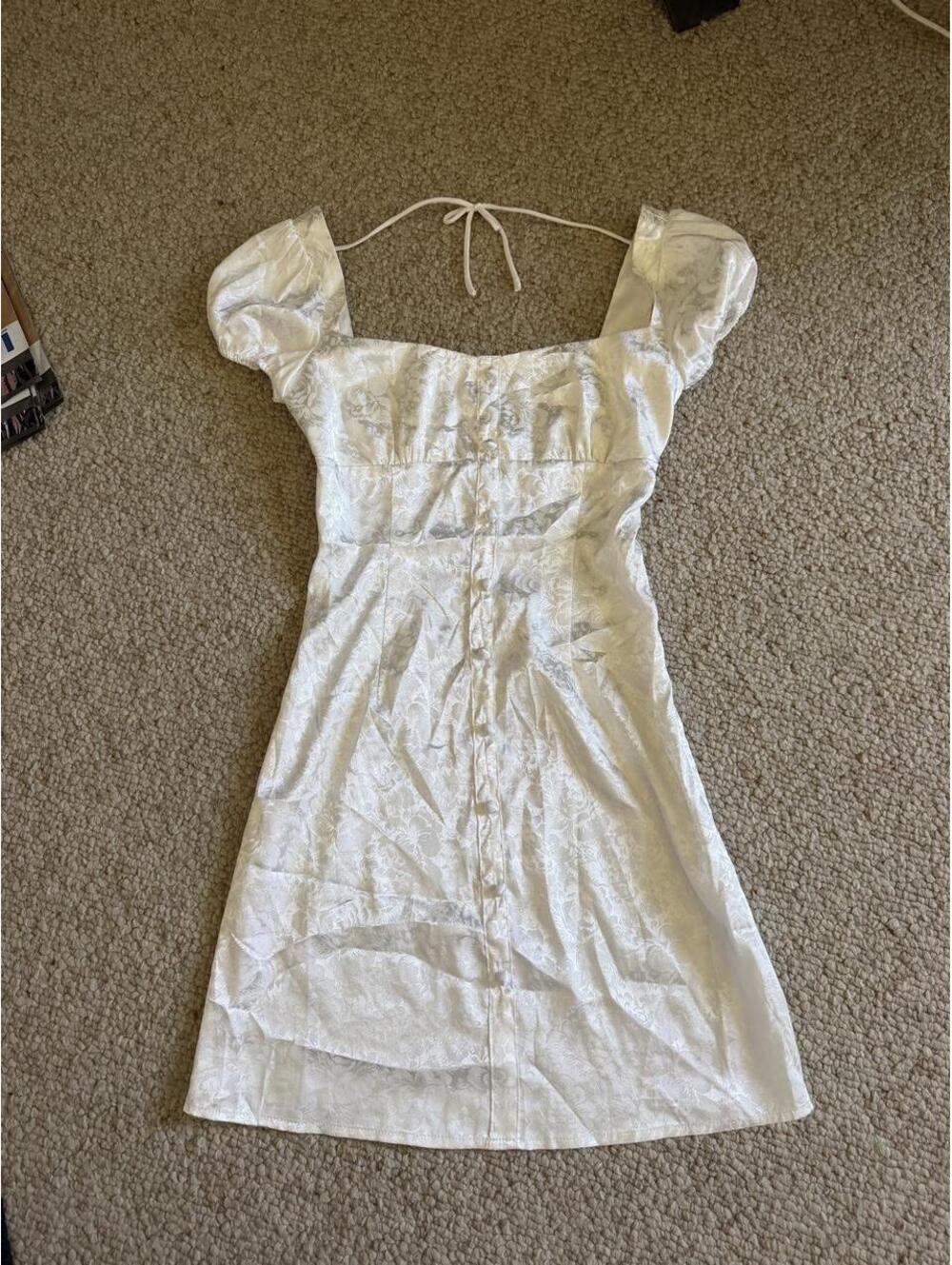 Princess Polly white mini dress with subtle floral design